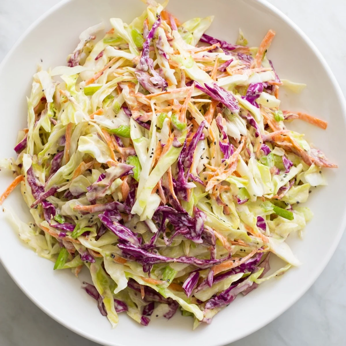 Crisp Quick Coleslaw Salad tossed in creamy dressing, a vibrant and refreshing American side dish!
