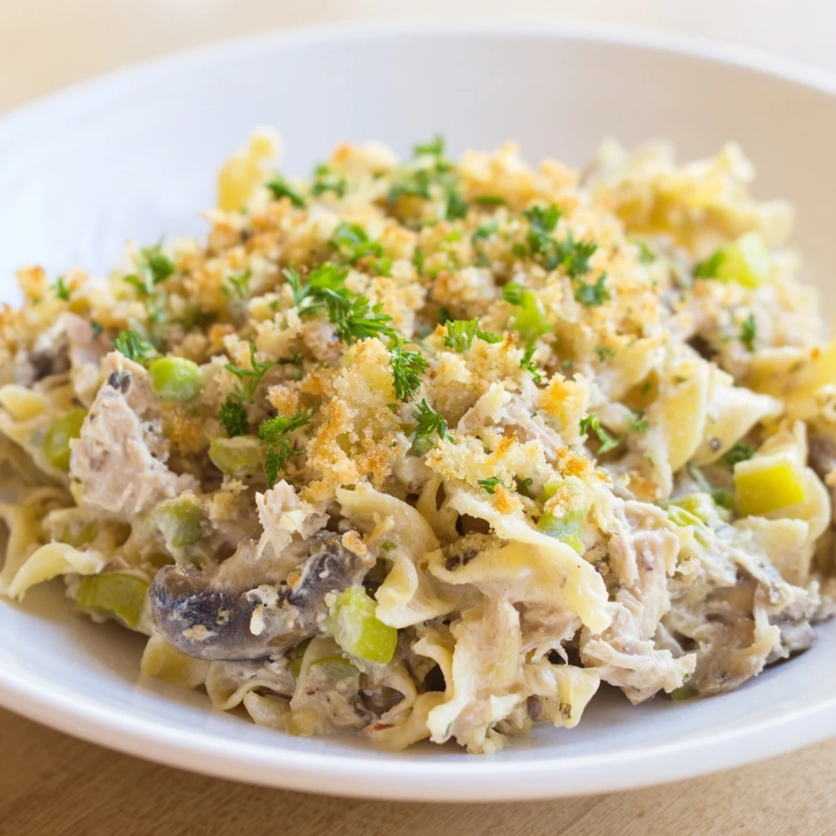 Creamy homemade Tuna Noodle Casserole 2.0 with tender noodles and juicy tuna, bubbling from the oven.