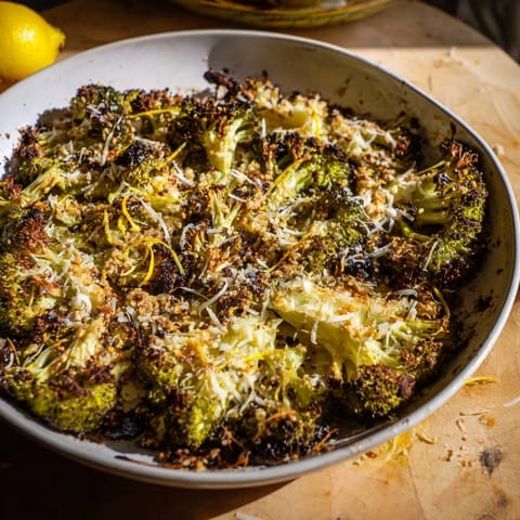 Vibrant image of Simple Garlic and Parmesan Roasted Broccoli, perfectly roasted with garlic and herbs, ideal side dish.