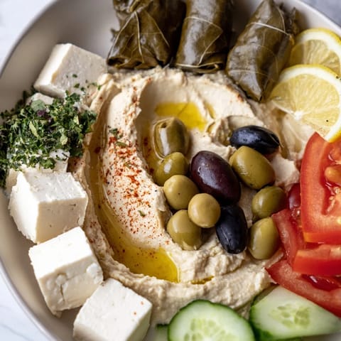 This vibrant image shows a delicious Turkish Meze platter, perfect for sharing and an appetizer.