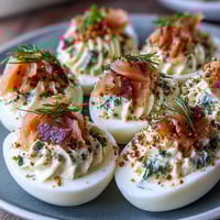 Smoked Salmon Deviled Eggs with Everything Seasoning: creamy filling topped with smoky salmon and crunchy seasoning blend.
